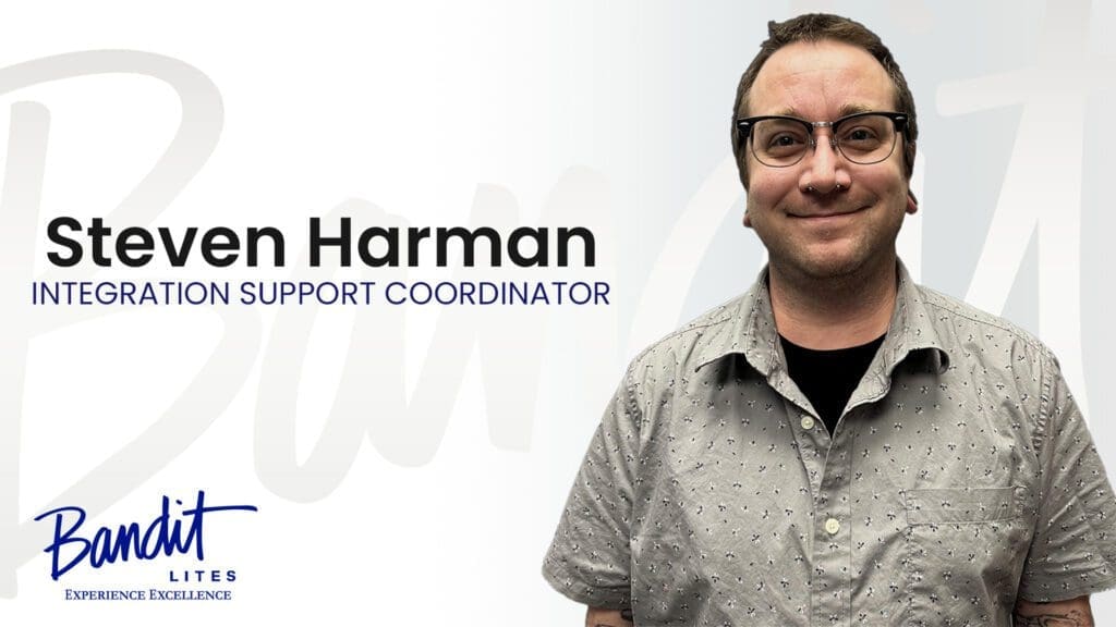 Portrait of a smiling male support coordinator named Harman.
