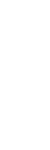 A tall, white candle glowing softly in the dark.