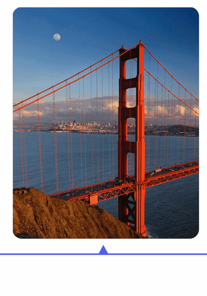 Golden Gate Bridge against a clear sky during sunset.